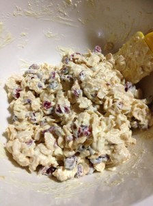 Stir in cornflakes, cranberries, almonds flakes (toasted). You can add anything you want to the mix actually.