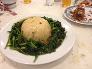 Loads of beancurd, and yams and other root vegetables inside the mould.